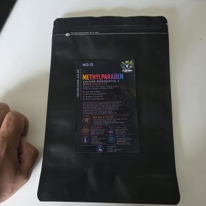 Methylparaben preservative powder used in fruit fly cultures and cosmetic formulations to inhibit mould and microbial growth