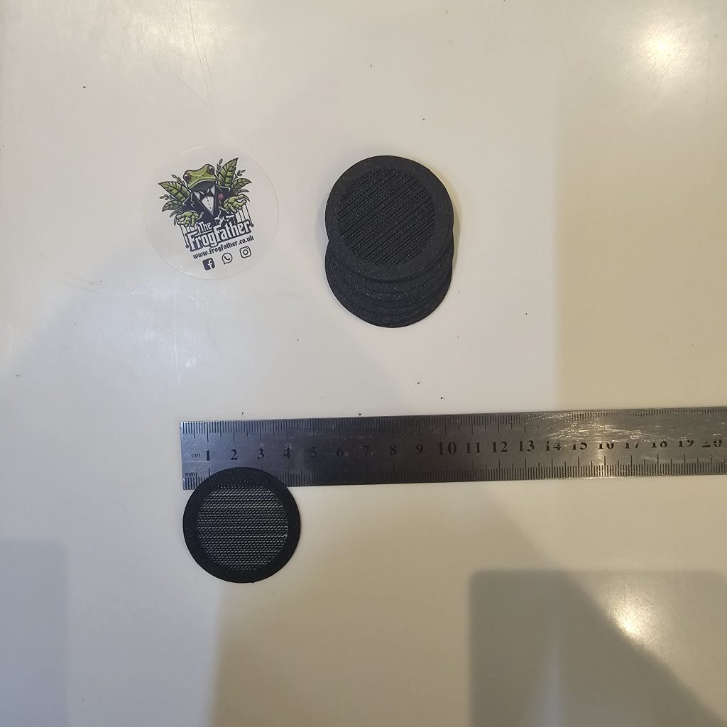 40 mm stick-on fine mesh ventilation disc for isopods and inverts shown next to a ruler for size reference