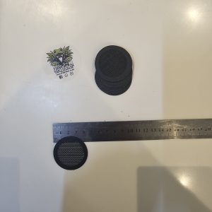 40 mm stick-on fine mesh ventilation disc for isopods and inverts shown next to a ruler for size reference