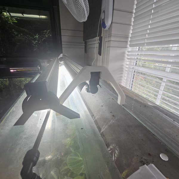Arcadia LumenIZE T5 light riser lifting lighting unit above bioactive dart frog vivarium